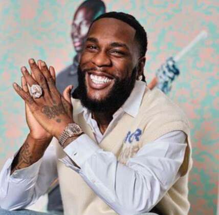 burna boy smiles